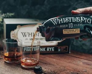 Experience the bold character of WhistlePig PiggyBank 10 Year—a 100% straight rye whiskey aged a full decade in new American oak barrels. This limited edition release offers deep spice, vanilla, and caramel notes in a playful pig-shaped bottle, perfect for collectors and rye enthusiasts.