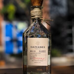 Experience Cazcanes Still Strength Blanco Tequila, a bold 110-proof tequila made from 100% Blue Weber agave. Pure, potent, and additive-free, it's crafted for serious tequila lovers