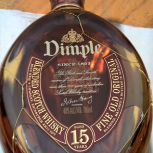Discover the smooth taste of Dimple Pinch Scotch Whisky. Aged 15 years, this premium blend delivers rich flavor and refined quality in every sip
