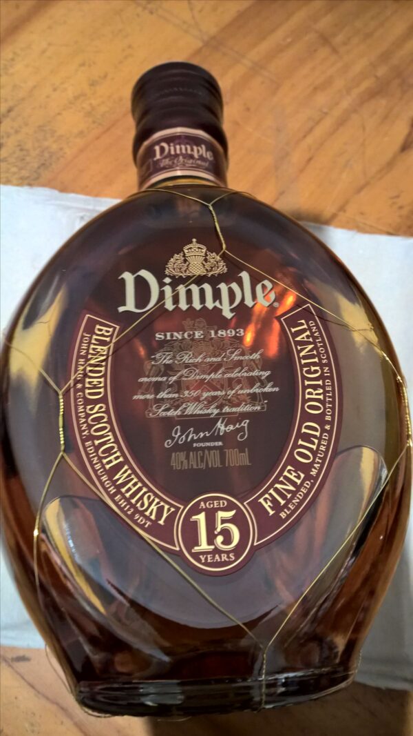 Discover the smooth taste of Dimple Pinch Scotch Whisky. Aged 15 years, this premium blend delivers rich flavor and refined quality in every sip
