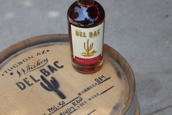 Buy Whiskey Del Bac Dorado, a bold mesquite-smoked American single malt whiskey. Explore rich notes of spice, oak, and caramel.