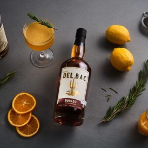 Buy Whiskey Del Bac Dorado, a bold mesquite-smoked American single malt whiskey. Explore rich notes of spice, oak, and caramel.