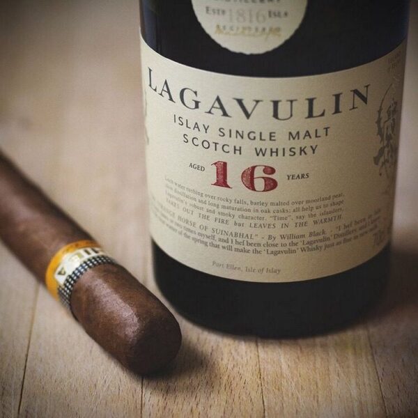 Buy Lagavulin 16 Year – legendary Islay single malt Scotch whisky with intense peat smoke, sherry sweetness, and a long finish.