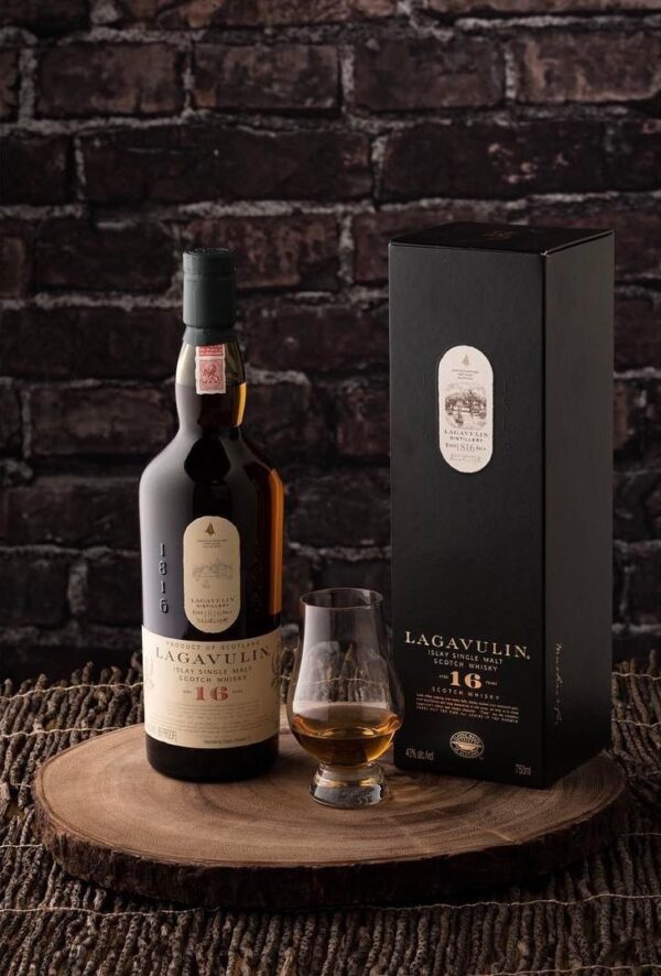 Buy Lagavulin 16 Year – legendary Islay single malt Scotch whisky with intense peat smoke, sherry sweetness, and a long finish.